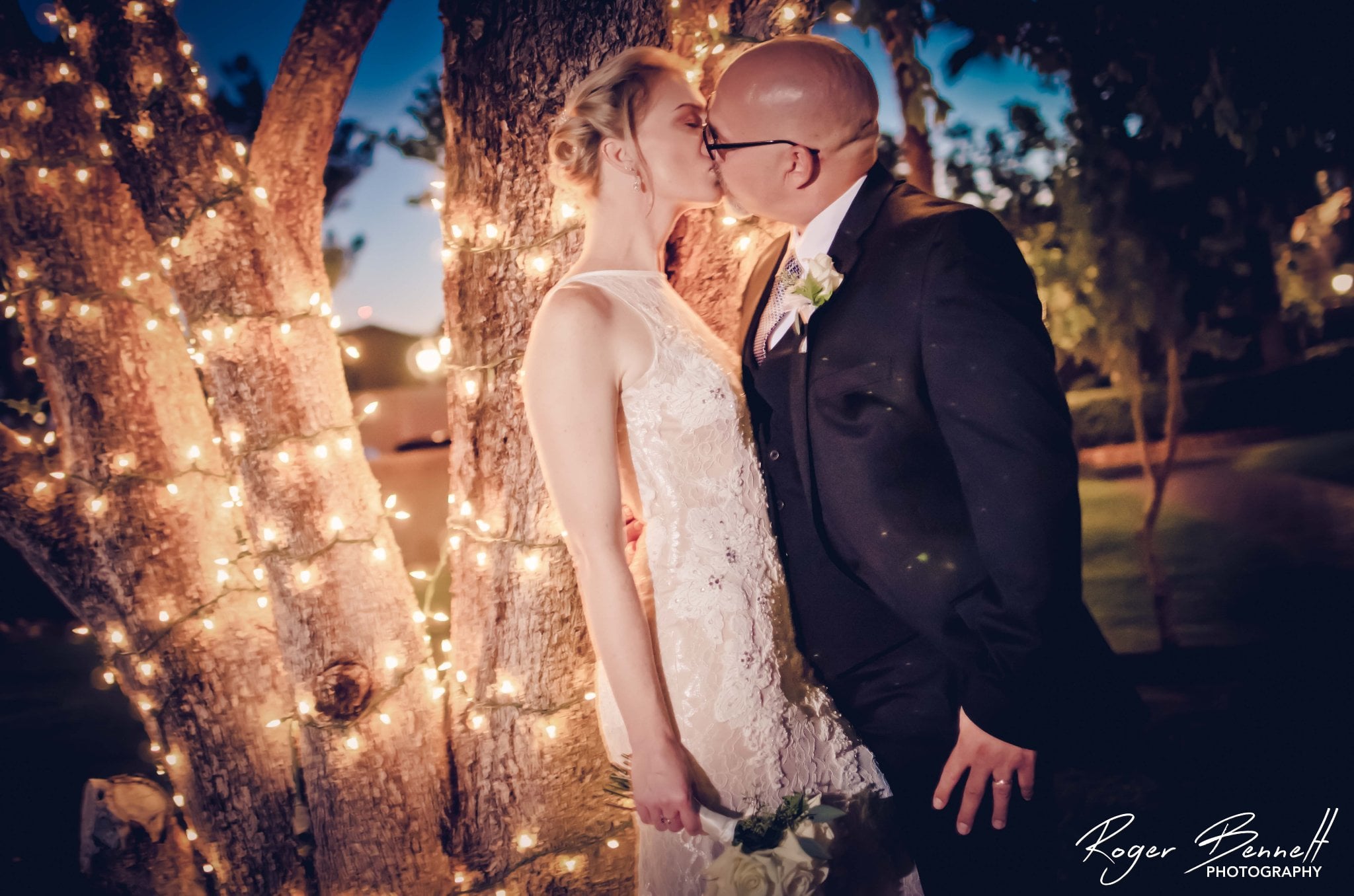 Wedding photographer capturing couple portraits